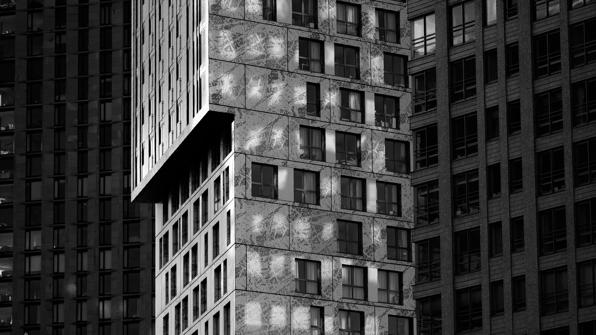 Immeubles en quinconce à Rotterdam, en noir et blanc